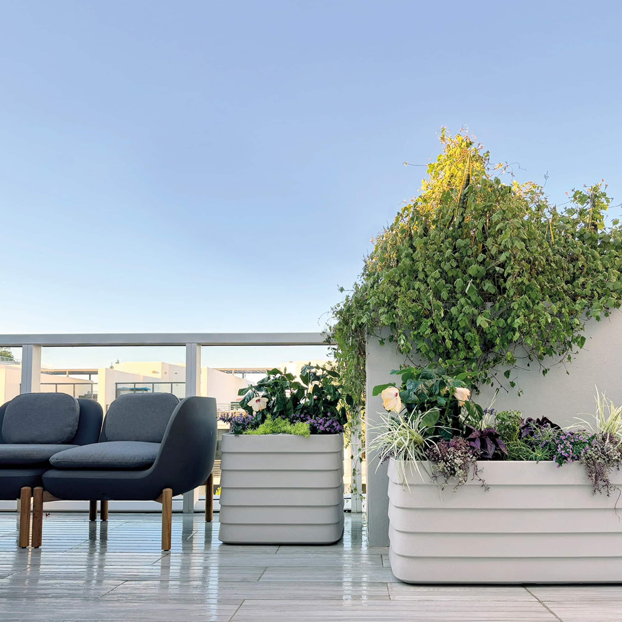 Crescent Garden InOu Elements 3-Seater Sofa in Shadow with Crescent Garden Slat TruDrop Self-Watering Planters in Parchment